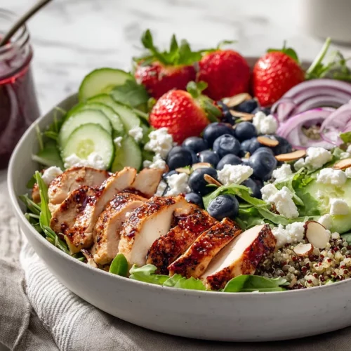 Berry Chicken Quinoa Salad with Strawberry-Balsamic Vinaigrette on a plate