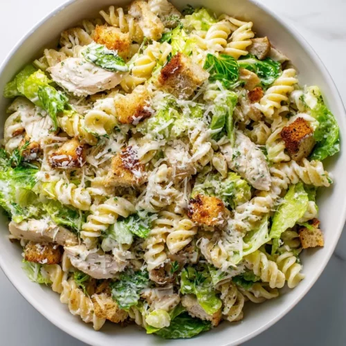 Delicious Chicken Caesar Pasta Salad with chicken, pasta, and Caesar dressing