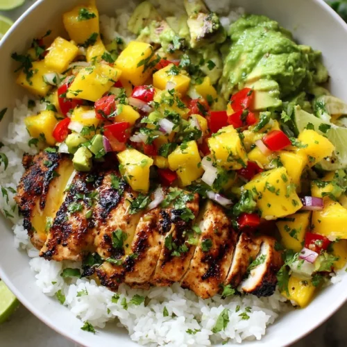 Grilled cilantro lime chicken garnished with fresh herbs and lime slices