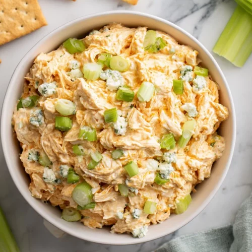 High protein buffalo chicken salad packed with flavor and nutrients.