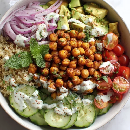 Mediterranean Quinoa Bowl with fresh vegetables and herbs