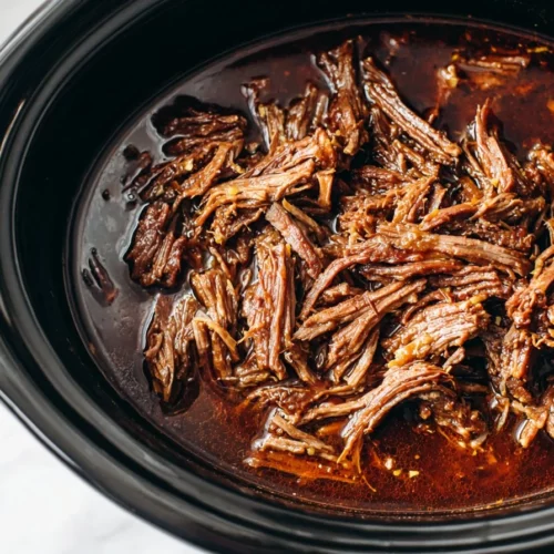 Delicious slow cooker French dip sandwich served with au jus