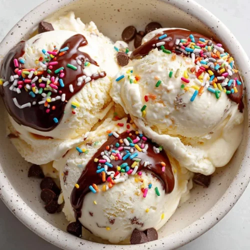 Delicious bowl of cottage cheese ice cream topped with fresh fruits.